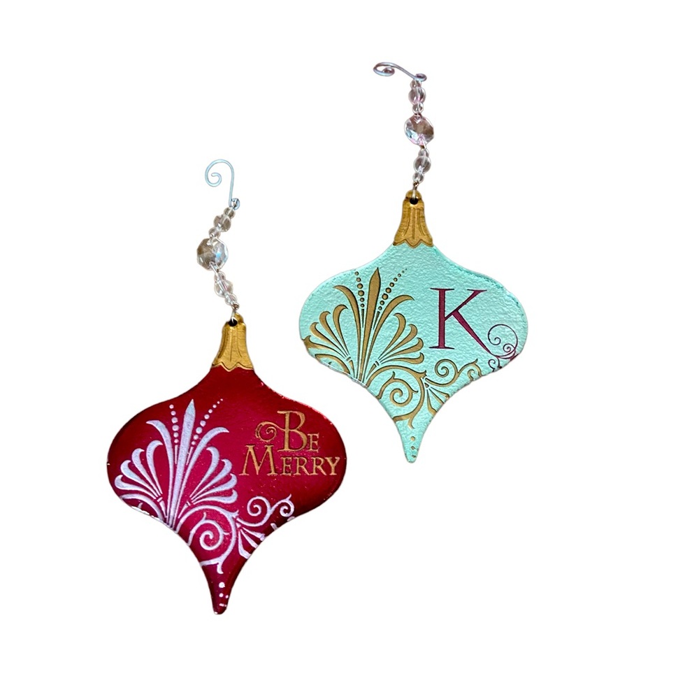Set of two beautiful glass ornaments.. Be Merry & K